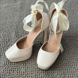 Elegant Cream High Heels with Ribbon and Pearl Detail